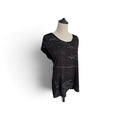A black short-sleeve top with a distressed, tonal abstract pattern, displayed on a mannequin torso against a white background.