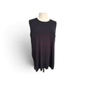 A sleeveless black top with a small chest pocket, displayed on a mannequin torso against a white background.
