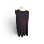 A sleeveless black top with a small chest pocket, displayed on a mannequin torso against a white background.