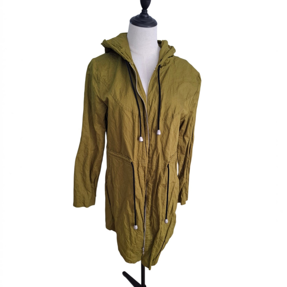 An olive green hooded jacket displayed on a white mannequin torso against a plain white background.