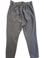 A pair of gray and black micro-check patterned pants with an elastic waistband, photographed flat against a white background.