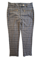 A pair of cropped plaid pants in a blue-gray and beige pattern, featuring two zippered pockets on the back and a single gold-tone button at the waistband, shown against a plain white background.
