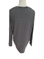 A black and white horizontally striped long-sleeve top displayed on a mannequin torso against a plain white background.