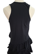 Black sleeveless ruffled top shown from the back on a cream-colored dress form mannequin against a white background.