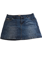 A blue denim mini skirt with a classic five-pocket design, laid flat against a white background.