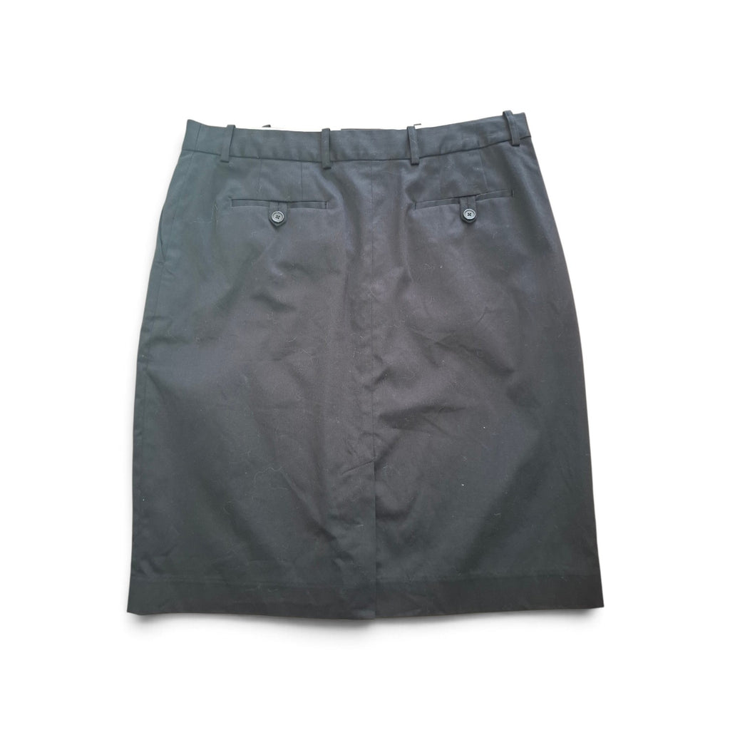 A dark gray skirt with a buttoned waistband and two buttoned flap pockets on the back, laid flat against a white background.