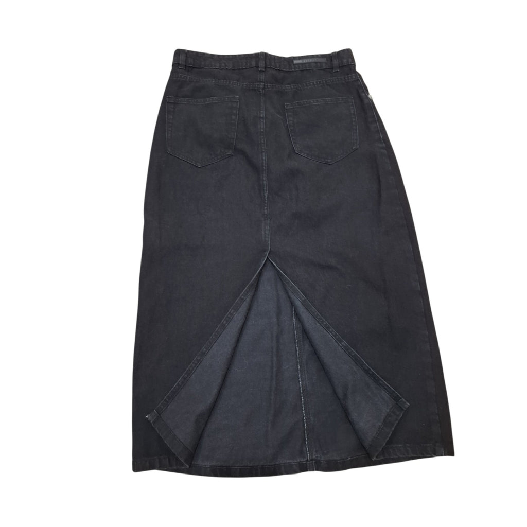 A dark charcoal gray denim midi skirt with a unique V-shaped split seam at the front hem, photographed flat against a solid white background.