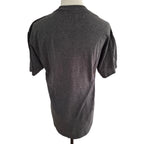 A dark gray heather short-sleeve t-shirt displayed on a mannequin torso from the back, against a plain white background.