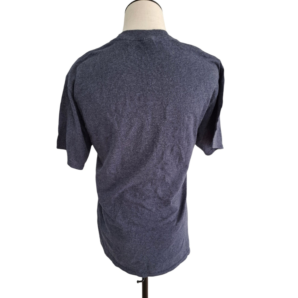 A dark heather gray short-sleeve t-shirt displayed on a mannequin torso from the back, set against a plain white background.