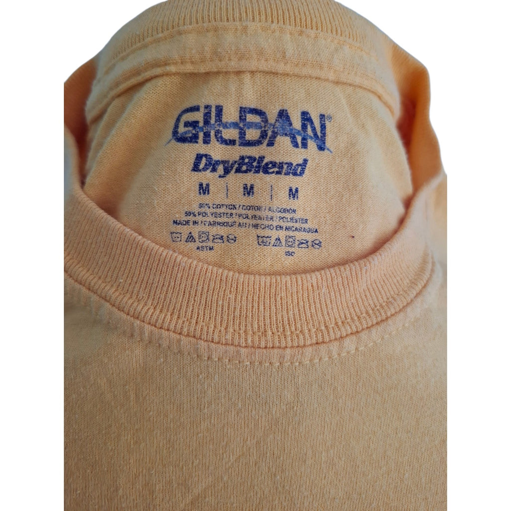Close-up of the inside collar of a Gildan DryBlend t-shirt in a light peach-beige color, showing the blue brand and size label.