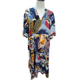 A short-sleeve V-neck kaftan dress with an abstract multicolor print, displayed on a mannequin torso against a white background.