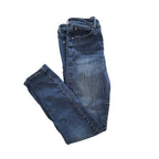 A pair of folded blue denim jeans with a faded wash, displayed on a solid white background.