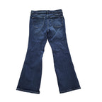 Back view of dark blue denim flare jeans on a solid white background.