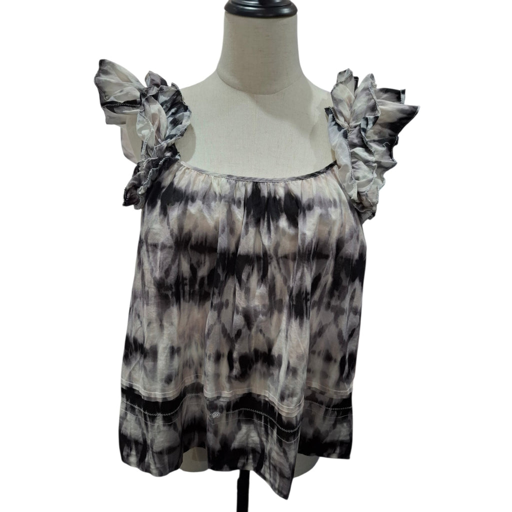 A women's sleeveless top with ruffled shoulder straps, displayed on a cream-colored dress form mannequin. The top features a black, gray, and beige tie-dye pattern.