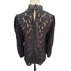 A black lace long-sleeve blouse with a high mock neck, displayed on a mannequin torso against a white background.