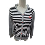 A gray and black horizontally striped cardigan sweater with solid gray sleeves, collar, and hem, featuring a small red embroidered logo on the left chest, displayed on a mannequin torso against a white background.
