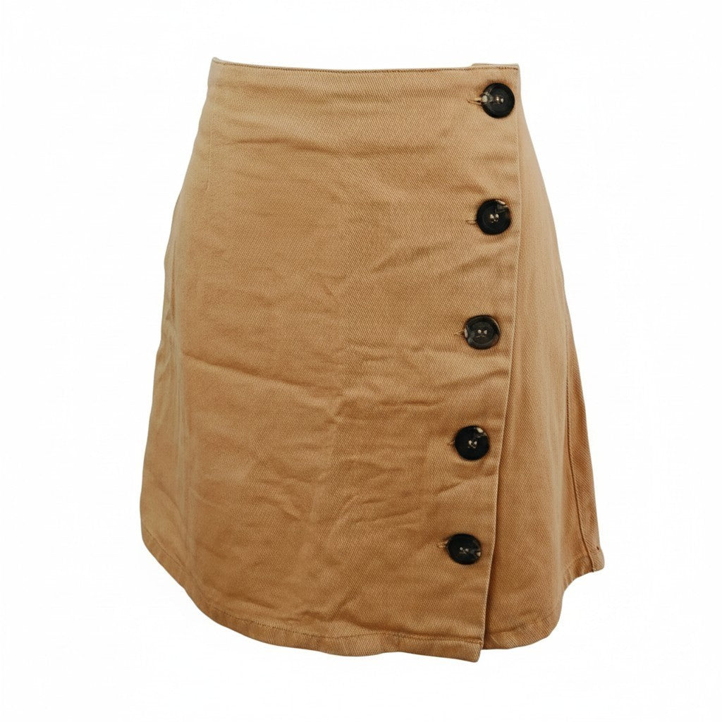 A tan wrap-style mini skirt with a prominent row of black buttons down the front, displayed against a solid white background.