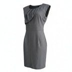 A sleeveless gray dress with a subtle windowpane plaid pattern, featuring a draped ruffle detail across the shoulders and a fitted knee-length silhouette, shown against a plain white background.